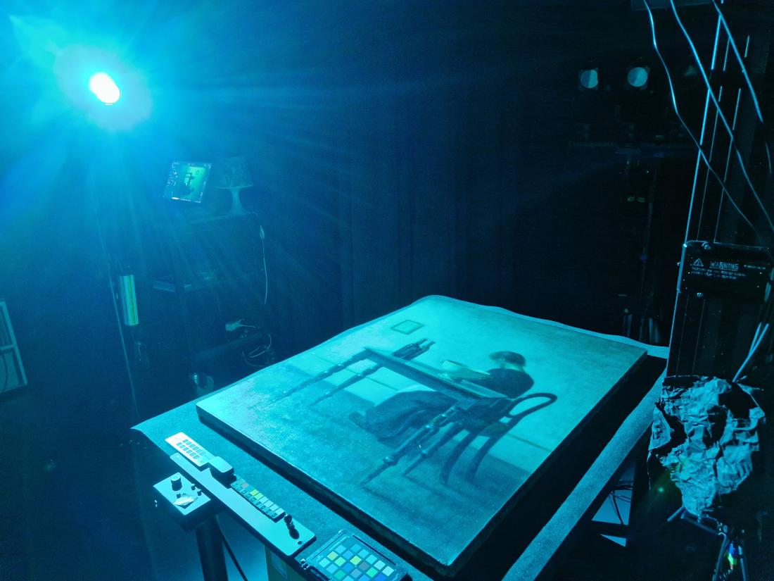 Hammershøi Interiør. En kvinde siddende bag et bord (Ordrupgaard) 